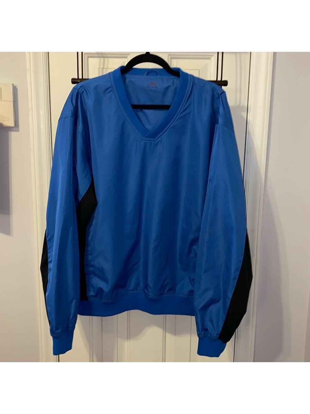 Men’s Acuity pullover. Blue and black, polyester and nylon